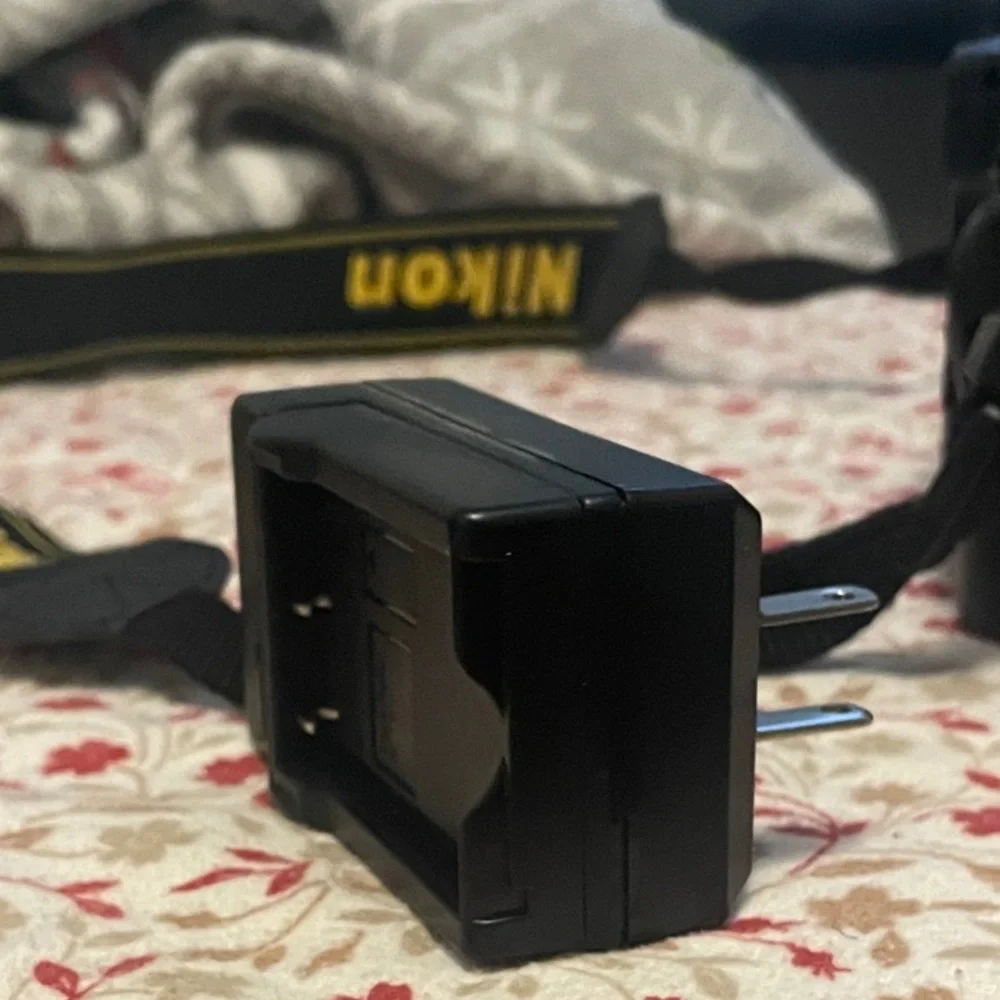 Nikon Black DSLR with Lens